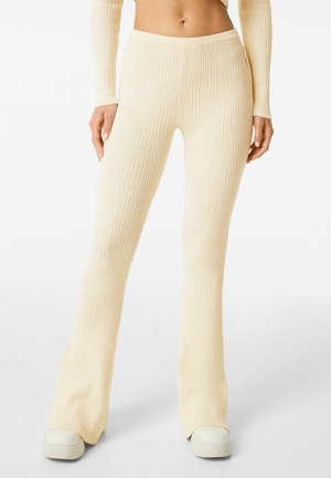 FLARED RUSTIC EFFECT - Pantaloni - offwhite