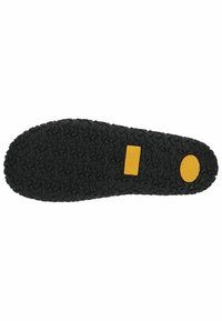 Schwarze Gummisohlen mit einer strukturierten Oberfläche und dreieckigen Mustern, einem gelben Markenlogo und einem runden gelben Akzentdetail.