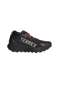 Chaussures de randonnée noires avec des accents orange, tige texturée, logo sur le côté, semelle extérieure robuste et semelle intermédiaire rembourrée pour adhérence et confort.