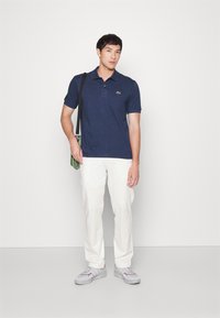Lacoste Polokošeľa - bleu chine