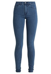 Jeans skinny in denim blu scuro con una texture liscia. Vita alta, tasche frontali e chiusura con bottone in vita.