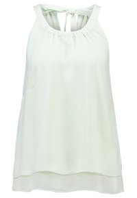Světle zelený bezrukávový top s kulatým výstřihem, šňůrkou na vázání vzadu a vrstveným designem s delším zadním lemem.