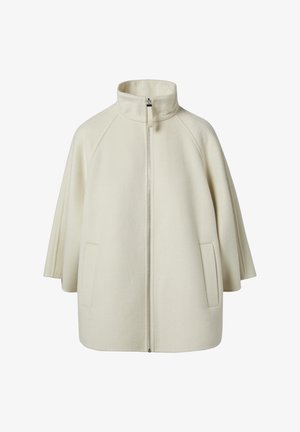 Cremfarbener Wollmantel mit hohem Kragen, durchgehendem Reißverschluss und Seitentaschen in einer entspannten, kapuzenähnlichen Silhouette.