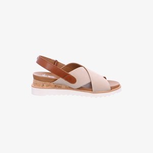 Beige and brown slingback sandal with crisscross leather straps, cork wedge heel, and white ridged sole.