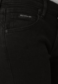 Marc O'Polo DENIM TROUSERS MID WAIST FLARED - Platėjantys džinsai - black