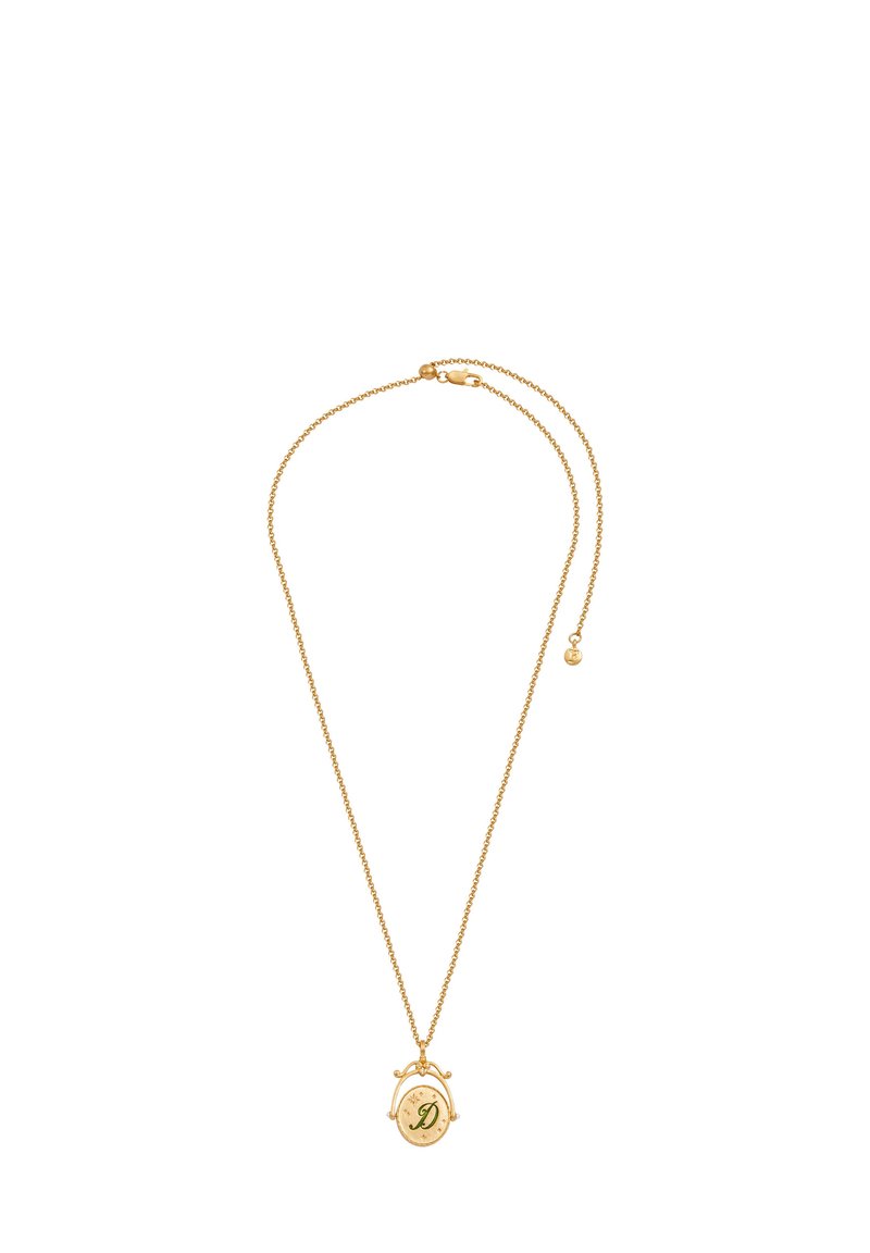 Zlatý náhrdelník s jemným reťazcom a okrúhlym príveskom so zeleným dizajnom písmena "D". Jednoduché uzavieranie na sponu.