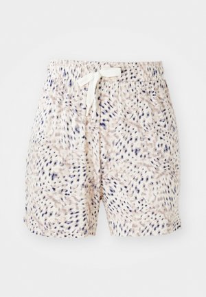Patterned shorts featuring a beige base with dark blue spots, an elastic waistband, and a drawstring for adjustment. Soft texture.