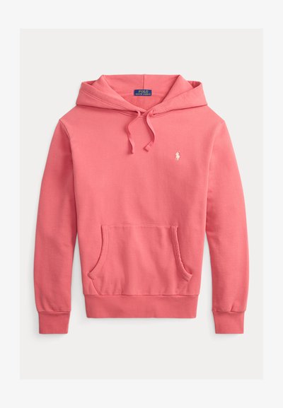 Ροζ φούτερ με κουκούλα από μαλακό ύφασμα, με μπροστινή τσέπη καγκουρό, ριμπ μανσέτες και μικρό λογότυπο στο στήθος. Κομμένο με άνετη εφαρμογή.