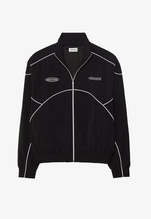 Schwarze Zip-Jacke mit weißen Kontrastnähten, hoher Kragen, elastischen Bündchen und strukturiertem Innenfutter. Verfügt über ein Logo auf der Brust.