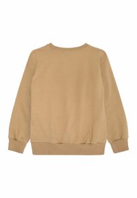 Beige hosszú ujjú pulóver bordás mandzsettával és szegéllyel. Simaság és kerek nyak, enyhén ráncolt oldalakkal a laza illeszkedés érdekében.