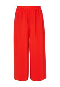 Culottes rouge à jambes larges avec une texture côtelée et une ceinture élastique. Le tissu est léger, idéal pour le confort et la liberté de mouvement.