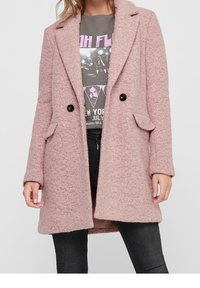 Ljust rosa, texturerad ullblandning kappa med skräddarsydd design, dubbelknäppta knappar, slagkrage och sidofickor.