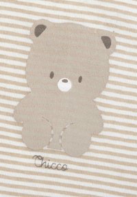 Beige striped fabric featuring a light brown bear graphic with a round face and small mouth, accompanied by the text "Chicco" in brown.