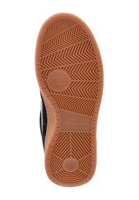 Talpa de pantof din cauciuc cu model de tip herringbone, finisaj texturat de culoare maro deschis, accente circulare și impronta logo-ului de marcă pe lateral.