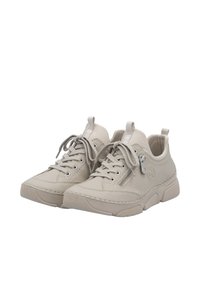 Baskets en cuir beige clair avec lacets, un design texturé, des semelles en caoutchouc et un détail de fermeture éclair sur le côté. Bout arrondi et col rembourré.