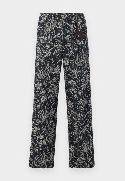 Navyblaue Blumenmuster-Hosen mit elastischem Bund, lose Passform und strukturiertem Stoff. Inklusive angebrahtes Etikett am Bund.