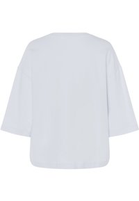 Světlemodré oversized tričko s širokými krátkými rukávy, kulatým výstřihem a hladkým texturem látky. Jednoduchý, jednobarevný design.