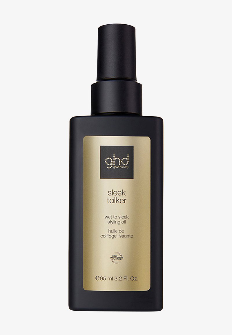 Bouteille de spray noire avec un dessus à pompe, comportant une étiquette dorée. Texte : "huile de coiffage humide pour un style élégant", volume de 95 ml.
