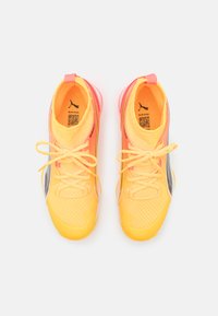 Puma ELIMINATE NITRO SQD - Handbalschoenen - sun stream/sunset glow/black