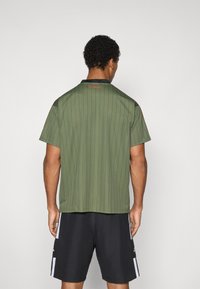 adidas Originals FC BAYERN ICON - Klub merchandise - base green