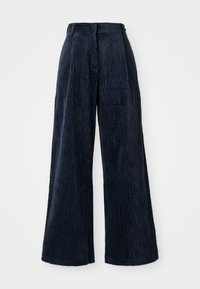 Wide-leg corduroy pants in dark navy. Features vertical ribbed texture and a high waistband, offering a structured, loose fit.