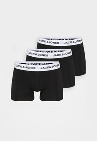 Drei Paar schwarze Herren-Boxershorts mit einem weißen elastischen Bund, der den Text "JACK & JONES" in Schwarz trägt. Glatte Textur, figurbetontes Design.