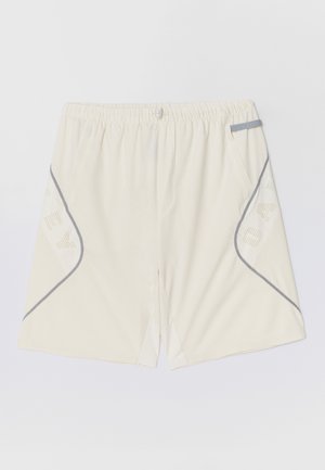 Bermudas atléticas de cor bege claro com um cós elástico, detalhes cinzentos e bolsos laterais com um padrão. Feitas de material respirável.