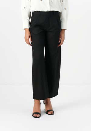 CRAWL - Pantaloni - black