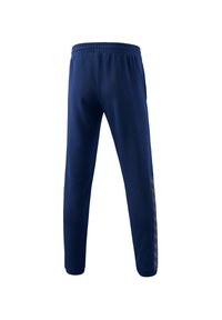 Marineblauwe sportieve sweatpants met een elastische tailleband, zijzakken en gemusterde zijaccenten in een lichtere kleur. Glad gevoel.