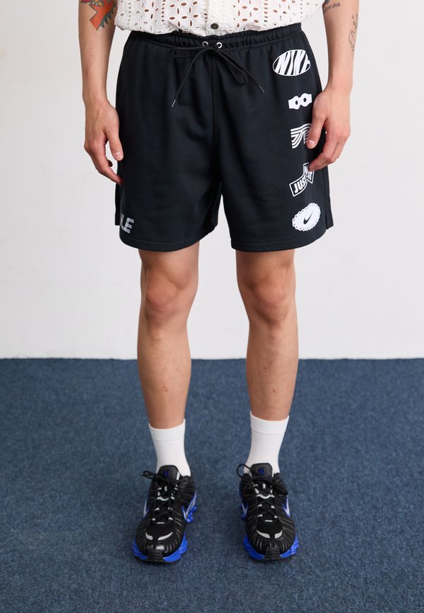 CLUB FLOW CYCLE - Tracksuit bottoms