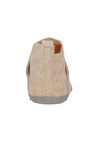 Beige filtsandaler med en afrundet ryg, grå gummi sål og et lille brunt læderdetalje på overdelen, der har en tekstureret overflade.