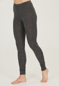 Leggings grises con una textura suave y elástica, que cuentan con un diseño ajustado y una cinturilla elástica, estrechándose en el tobillo.