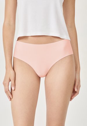 Pfirsichfarbene Bikiniunterhose aus glattem, dehnbarem Material, mit einem niedrig geschnittenen Design und minimalistischer Schnittführung, versehen mit einem nahtlosen Bund.