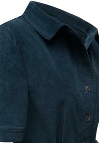 Mørkeblå corduroy-skjorte med spidst krave, korte ærmer og en række på fem knapper foran. Blød tekstur og ren finish.