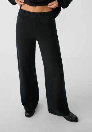 WIDE - Stoffhose - black