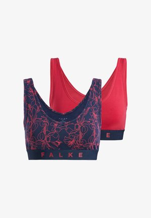 Due reggiseni: uno blu navy con motivo floreale rosso, l'altro rosso uniforme. Entrambi presentano spalline larghe e una banda a contrasto con il logo "FALKE".