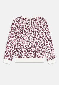 Maglione a maniche lunghe con base bianca e stampa leopardata rosa e viola su tutta la superficie, con polsini e orlo a costine.