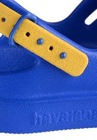 Havaianas Zuecos - blue yellow gold