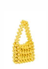Borsa gialla realizzata con perline rotonde collegate. Presenta una tracolla arrotondata e una forma solida e strutturata. Texture liscia con una finitura lucida.