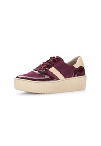 Plush burgundy sneakers with patent leather accents, beige suede stripes, round toe, and a textured cream platform sole.