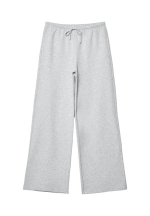 Pantaloni felpa grigi chiari realizzati in tessuto morbido, con una silhouette a gamba larga, cintura elastica e chiusura con coulisse. Senza tasche né decorazioni.