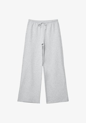 Světle šedé tepláky vyrobené z měkké tkaniny, s volným střihem, elastickým pasem a stahovací šňůrkou. Bez kapes či ozdob.