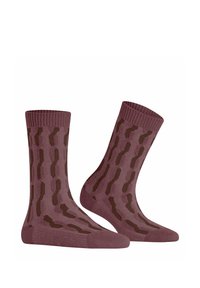 Burgunderfarbene Socken mit einem strukturierten Muster, das wellenförmige Linien in Dunkelbraun ähnelt. Mit gerippten Bündchen und einer mittellangen Ausführung. Aus weichem Strickmaterial.