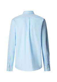 Chemise habillée bleu clair à manches longues vue de dos avec col boutonné et poignets boutonnés.