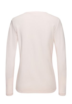 Long-sleeve top in soft pink fabric, featuring a rounded neck and smooth texture. No patterns or additional details visible.