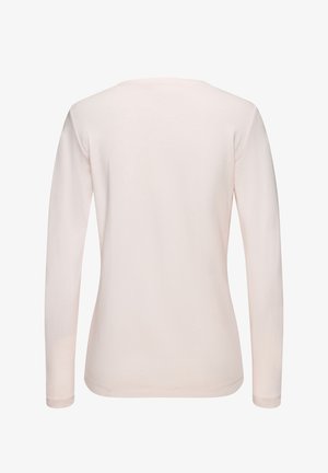 Long-sleeve top in soft pink fabric, featuring a rounded neck and smooth texture. No patterns or additional details visible.