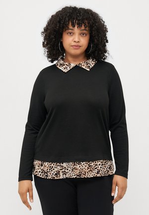 Black long-sleeve top with a leopard print collar and hem. The collar features shades of beige and brown, adding contrast to the solid black fabric.