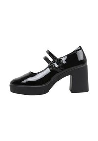 Zapatos Mary Jane de charol negro con dos correas de hebilla, punta redondeada y tacón cuadrado grueso. Acabado suave y detalles mínimos.