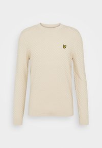Cremefarbener, strukturierter Pullover mit langen Ärmeln, rundem Halsausschnitt und kleinem gelben Vogel-Logo auf der linken Brust.