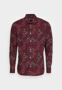Bordowa koszula z długim rękawem z wzorem liści, kołnierzykiem na guziki i białymi guzikami. Tkanina ma gładką fakturę o delikatnym połysku.
